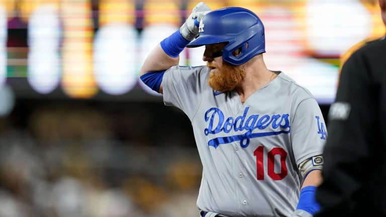 Los Angeles Dodgers' Justin Turner reacts after hitting a single during the second inning in Game 4 of a baseball NL Division Series, Saturday, Oct. 15, 2022, in San Diego. (Ashley Landis/AP Photo)