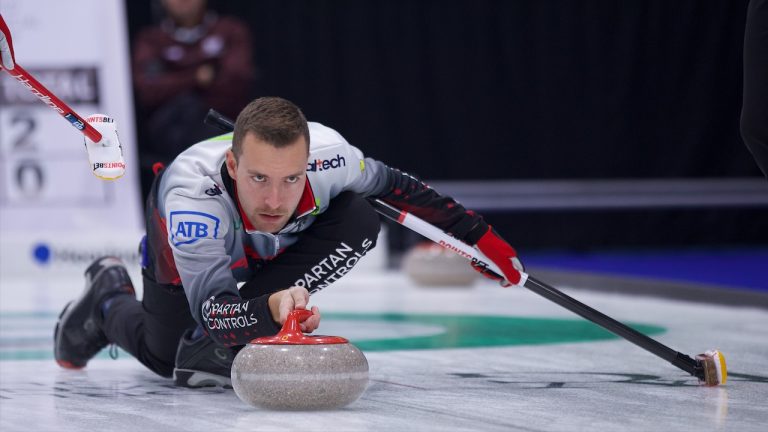 Brendan Bottcher shoots a stone during the fourth draw of the WFG Masters on Dec. 6, 2022, at Sixteen Mile Sports Complex in Oakville, Ont. (Anil Mungal/GSOC)