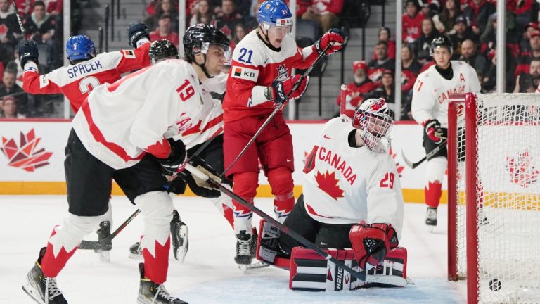 Czechia's Jaroslav Chmelar, centre, celebrates a goal in front of Canada's goaltender Benjamin Gaudreau, right, and Adam Fantilli during first period IIHF World Junior Hockey Championship hockey action in Halifax, Monday, Dec. 26, 2022. (Darren Calabrese/CP)