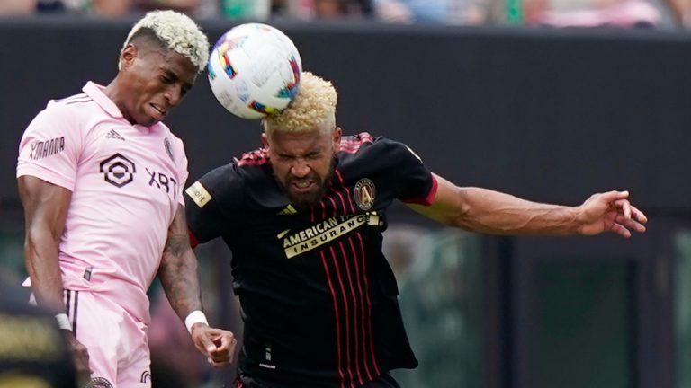 Inter Miami midfielder Emerson Rodriguez, left, and former Atlanta United defender George Campbell head the ball, Sunday, April 24, 2022, during the second half of an MLS soccer match in Fort Lauderdale, Fla. (Wilfredo Lee/AP)