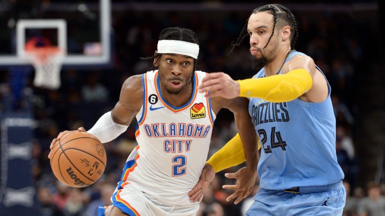 Oklahoma City Thunder guard Shai Gilgeous-Alexander (2) drives against Memphis Grizzlies forward Dillon Brooks (24) in the second half of an NBA basketball game Wednesday, Dec. 7, 2022, in Memphis, Tenn. (Brandon Dill/AP)