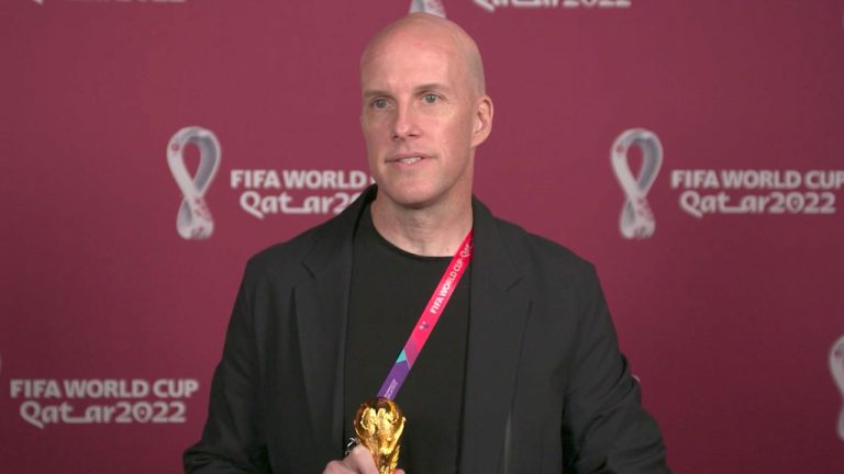 A photo taken from video provided by FIFA of journalist Grant Wahl at an awards ceremony in Doha, Qatar. (FIFA/AP)