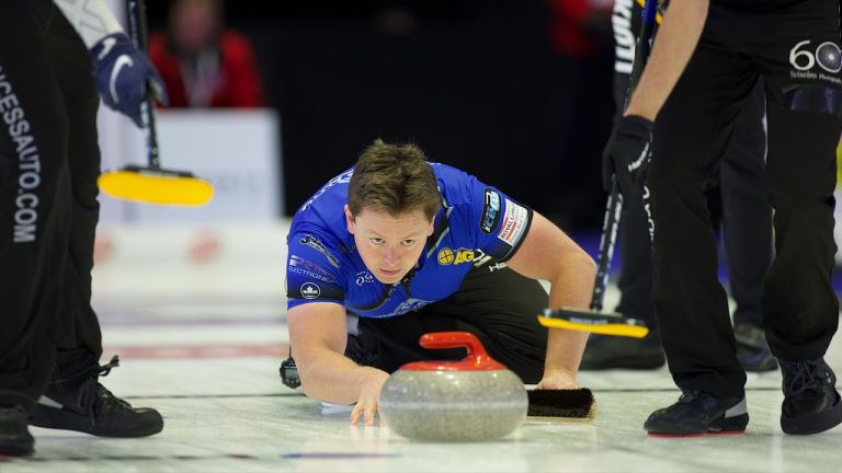 Jason Gunnlaugson shoots a stone during the 2022 Boost National at Memorial Gardens in North Bay, Ont. (Anil Mungal/GSOC)