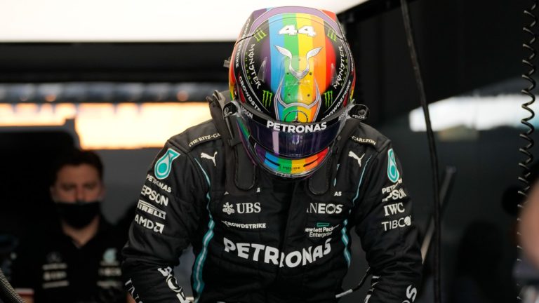 Mercedes driver Lewis Hamilton of Britain wears a rainbow helmet during practice session in Lusail, Qatar, Saturday, Nov. 20, 2021 ahead of the Qatar Formula One Grand Prix. (Darko Bandic/AP)