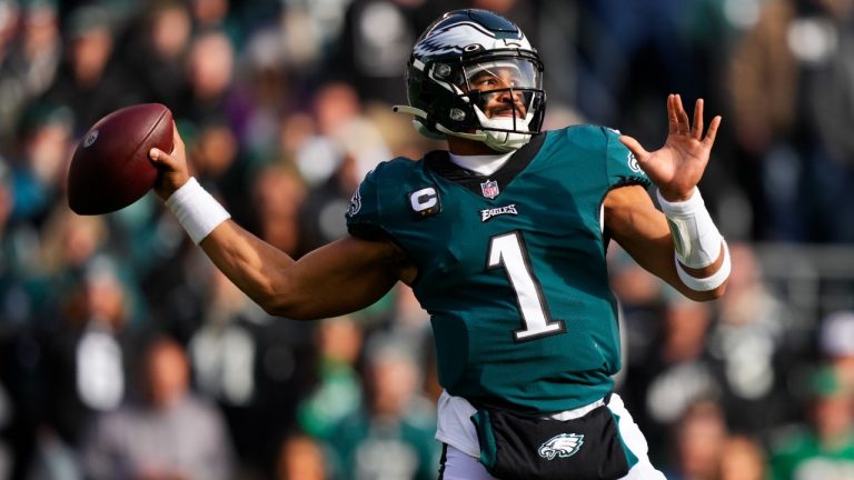 Philadelphia Eagles' Jalen Hurts looks to pass during the first half of an NFL football game against the Tennessee Titans, Sunday, Dec. 4, 2022, in Philadelphia. (Matt Slocum/AP)