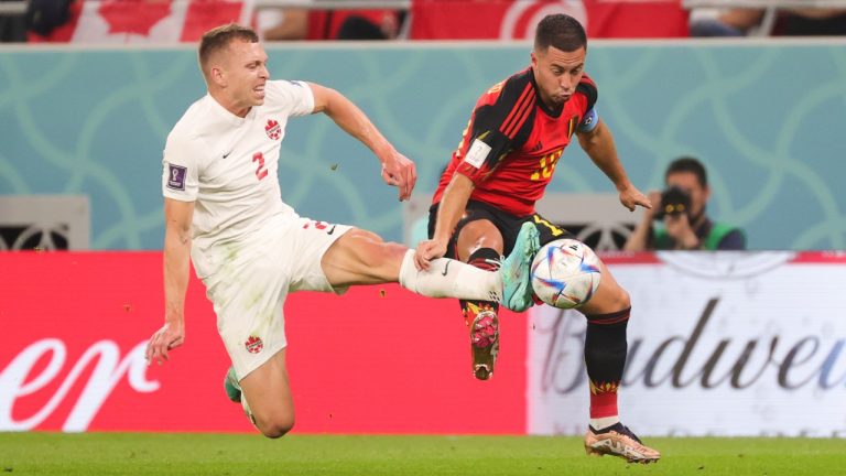 Canadian Alistair Johnston and Belgium's Eden Hazard fight for the ball during a soccer game between Belgium's national team the Red Devils and Canada, in Group F of the FIFA 2022 World Cup in Al Rayyan, State of Qatar on Wednesday 23 November 2022. (Virginie Lefour/Belga Photo)