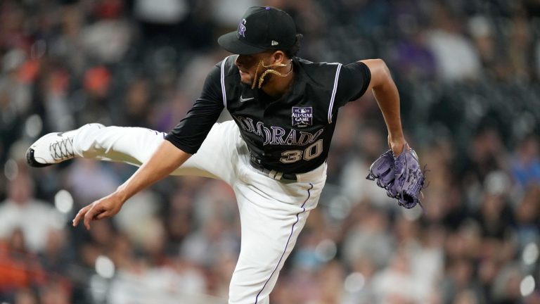 Colorado Rockies relief pitcher Julian Fernandez works against the San Francisco Giants in the ninth inning of a baseball game. (David Zalubowski/AP)