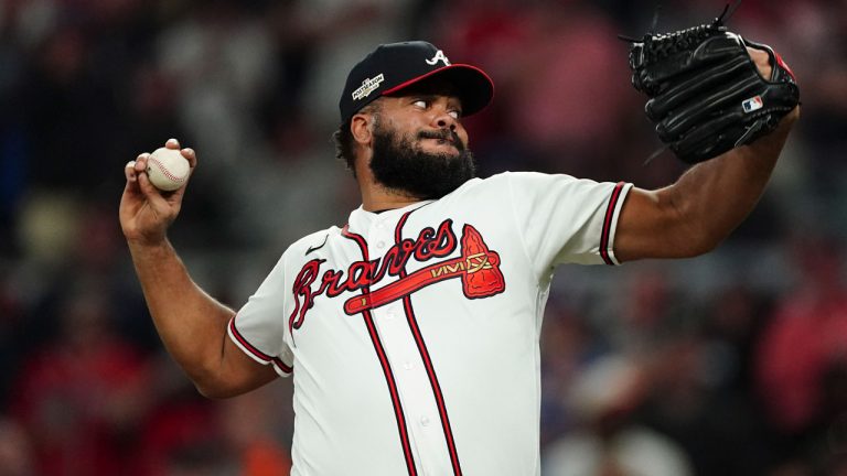 Atlanta Braves relief pitcher Kenley Jansen (74) works during the ninth inning in Game 2 of baseball's National League Division Series between the Atlanta Braves and the Philadelphia Phillies. (John Bazemore/AP)