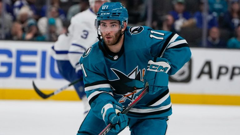 San Jose Sharks center Luke Kunin (11) looks to pass against the Toronto Maple Leafs during the second period of an NHL hockey game in San Jose, Calif., Thursday, Oct. 27, 2022. (Godofredo A. Vasquez/AP)