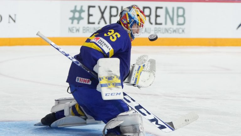 Sweden goaltender Carl Lindbom makes a save during second period IIHF World Junior Hockey Championship hockey action against Germany in Halifax on Tuesday, December 27, 2022. (Darren Calabrese/CP)