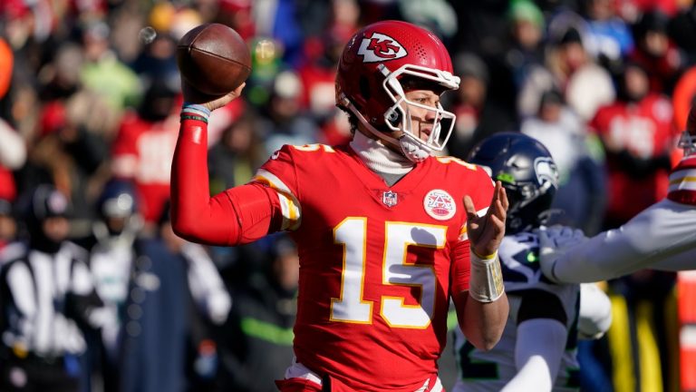 Kansas City Chiefs quarterback Patrick Mahomes (15) throws during the first half of an NFL football game against the Seattle Seahawks Saturday, Dec. 24, 2022, in Kansas City, Mo. (Ed Zurga/AP Photo)