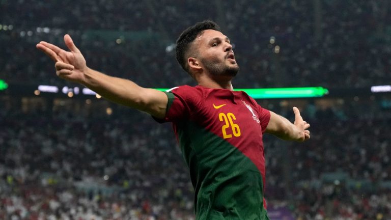 Portugal's Goncalo Ramos celebrates after scoring his side's fifth goal during the World Cup round of 16 soccer match between Portugal and Switzerland, at the Lusail Stadium in Lusail, Qatar, Tuesday, Dec. 6, 2022. (AP Photo/Alessandra Tarantino)