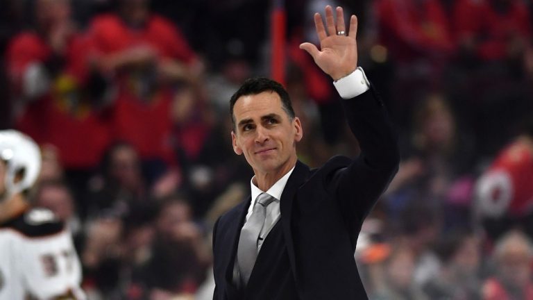 Former Ottawa Senators player Wade Redden waves to fans after a pregame ceremony recognizing his induction into the Senators' Ring of Honour, before an NHL hockey game between the Ottawa Senators and the Anaheim Ducks in Ottawa, on Monday, Dec. 12, 2022. THE CANADIAN PRESS/Justin Tang