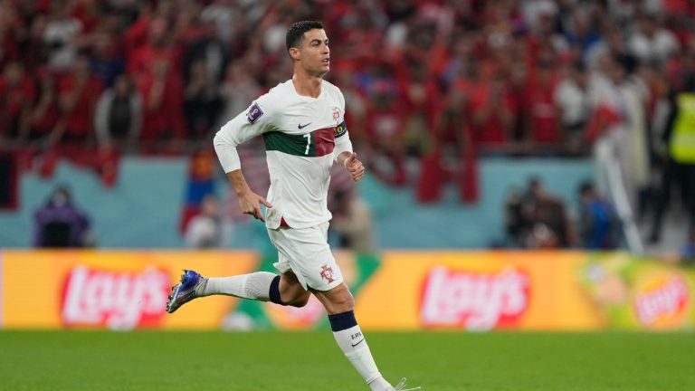 Portugal's Cristiano Ronaldo enters the pitch during the World Cup quarterfinal soccer match between Morocco and Portugal, at Al Thumama Stadium in Doha, Qatar, Saturday, Dec. 10, 2022. (Martin Meissner/AP)