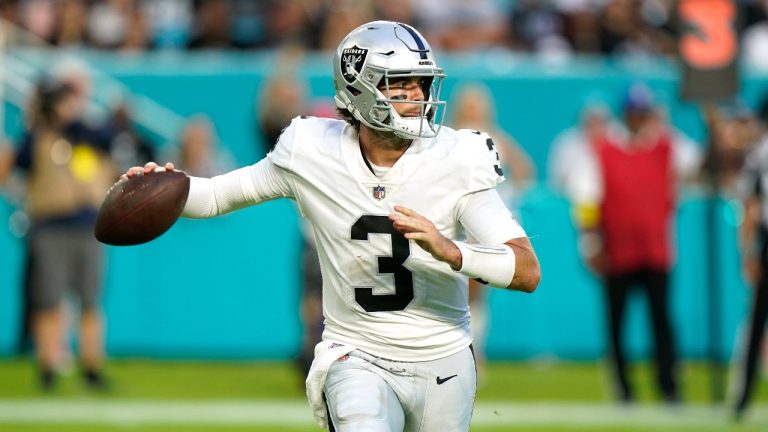 Las Vegas Raiders quarterback Jarrett Stidham (3) aims a pass during the first half of a NFL preseason football game against the Miami Dolphins, Saturday, Aug. 20, 2022, in Miami Gardens, Fla. (Wilfredo Lee/AP)