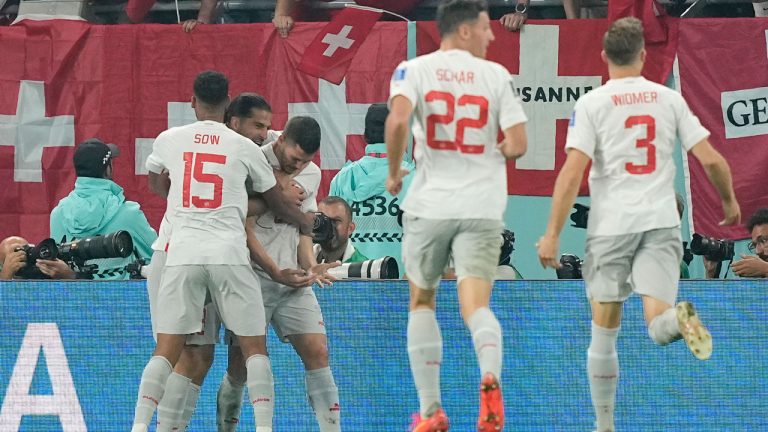 Switzerland's Remo Freuler, third from left, celebrates with his teammates after scoring his side's third goal during the World Cup group G soccer match. (Martin Meissner/AP)