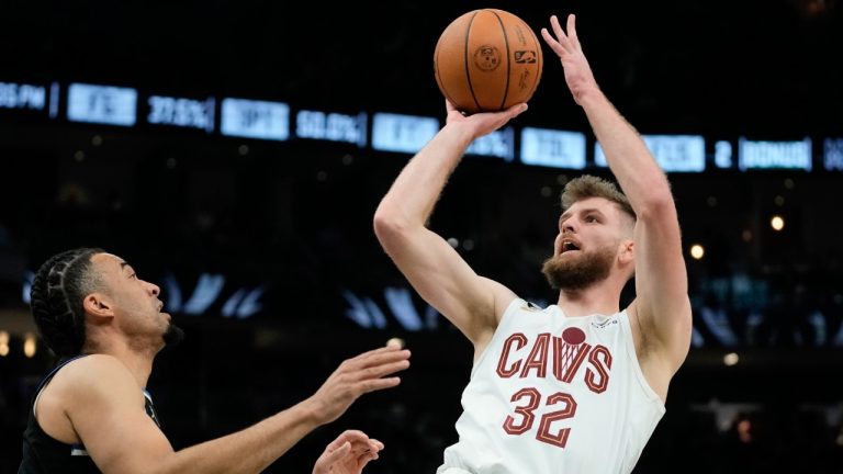 Cleveland Cavaliers' Dean Wade shoots over Milwaukee Bucks' Jordan Nwora during the first half of an NBA basketball game Friday, Nov. 25, 2022, in Milwaukee. (Morry Gash/AP)