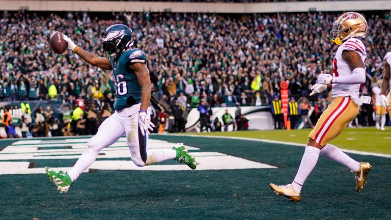 Philadelphia Eagles running back Miles Sanders, left, celebrates after scoring during the first half of the NFC Championship NFL football game between the Philadelphia Eagles and the San Francisco 49ers. (Matt Rourke/AP)