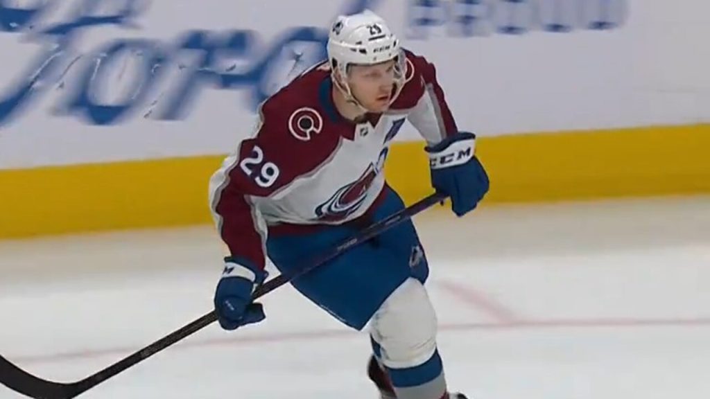 Nathan MacKinnon hat trick clinches division title for Avalanche