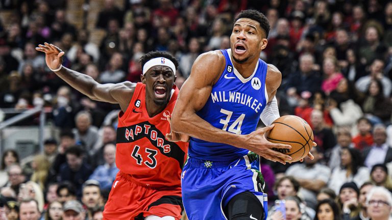 Milwaukee Bucks forward Giannis Antetokounmpo (34) drives towards the net as Toronto Raptors forward Pascal Siakam (43) defends during first half NBA basketball action in Toronto on Wednesday, January 4, 2023. (Christopher Katsarov/CP)