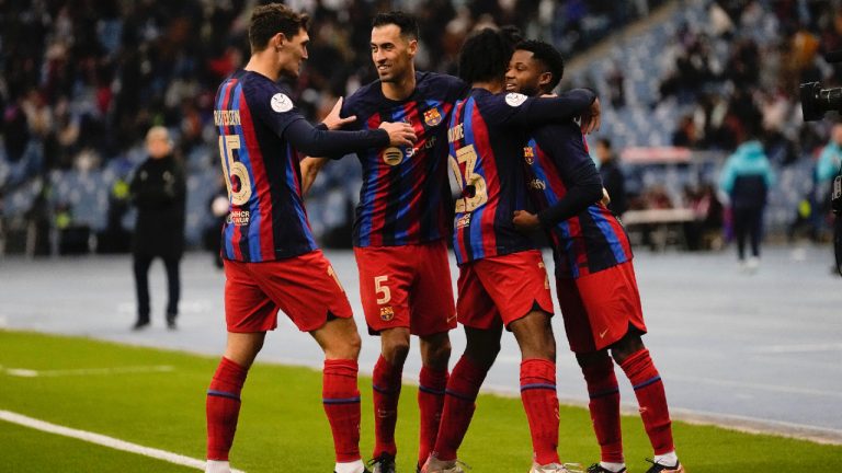 Barcelona's players celebrate after a goal during a semi-final of the Spanish Super Cup between Barcelona and Real Betis in Riyadh, Saudi Arabia, Thursday, Jan. 12, 2023. (Hussein Malla/AP)