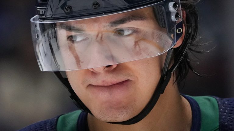 Vancouver Canucks' Ethan Bear lines up for a faceoff during the third period of an NHL hockey game against the New Jersey Devils in Vancouver, B.C., Tuesday, Nov. 1, 2022. (Darryl Dyck/THE CANADIAN PRESS)