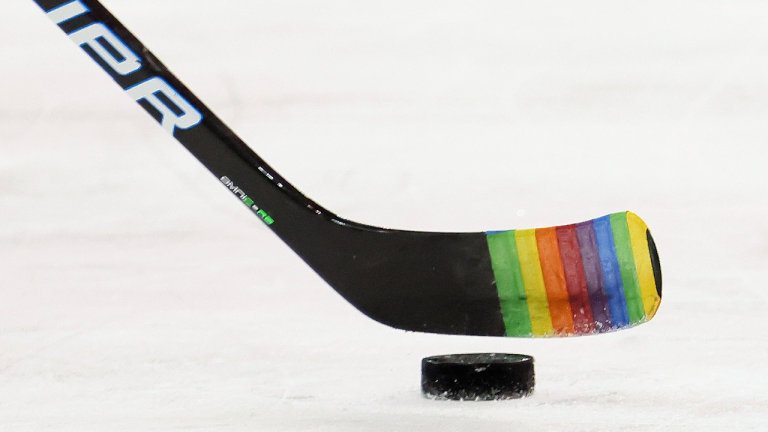 Zac Jones of the New York Rangers skates with a stick decorated for "Pride Night" in warm-ups prior to the game against the Washington Capitals Monday, May 3, 2021, in New York City. (AP)