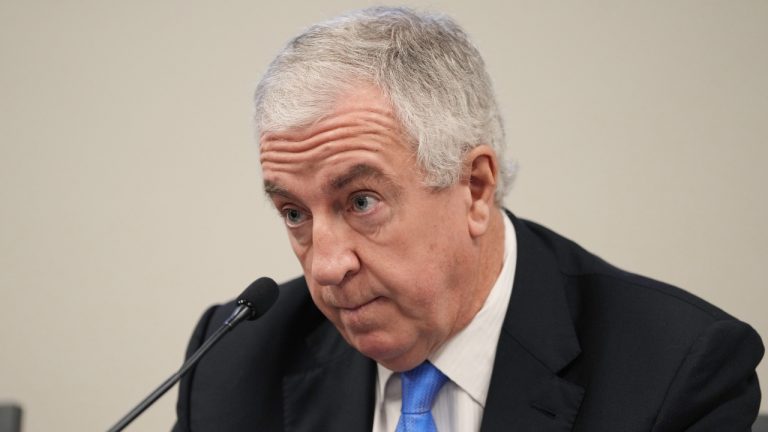 Luc Tardif, IIHF President, answers questions from reporters during a press conference at the IIHF World Junior Hockey Championship. (Darren Calabrese/AP)