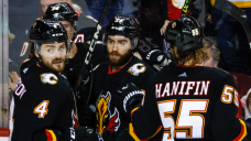 Andersson has goal, two assists to lead Flames to victory over Lightning