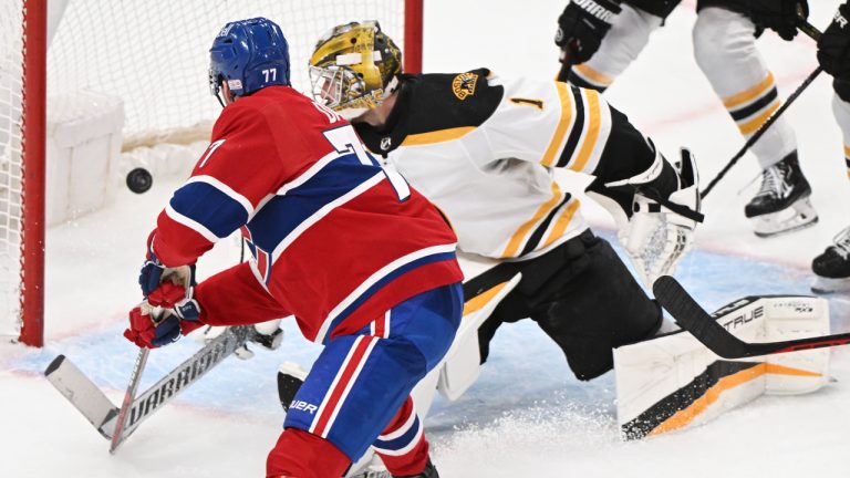 Montreal Canadiens' Kirby Dach scores against Boston Bruins goaltender Jeremy Swayman during third period NHL hockey action in Montreal, Tuesday, January 24, 2023. THE CANADIAN PRESS/Graham Hughes