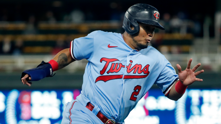 Minnesota Twins' Luis Arraez rounds third base en route to scoring against the Chicago White Sox on a double by Jose Miranda in the third inning of a baseball game Tuesday, Sept. 27, 2022, in Minneapolis. (AP)