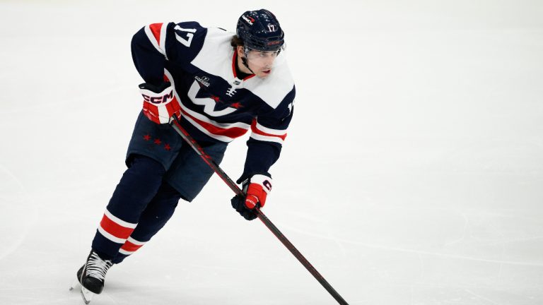 Washington Capitals centre Dylan Strome (17) skates with the puck during the third period of an NHL hockey game. (Nick Wass/AP)