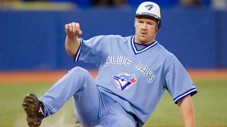 Toronto Blue Jays third baseman Scott Rolen tags home plate as he slides in to score during fourth inning AL action against the Baltimore Orioles in Toronto on Friday May 1, 2009. THE CANADIAN PRESS/Frank Gunn