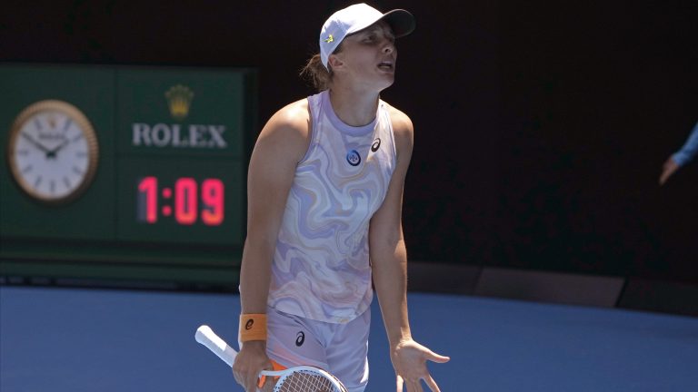 Iga Swiatek of Poland reacts as she plays against Elena Rybakina of Kazakhstan during their fourth round match at the Australian Open tennis championship in Melbourne, Australia, Sunday, Jan. 22, 2023. (Mark Baker/AP)