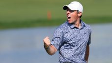 McIlroy overcomes Reed, wins Dubai Desert Classic by one shot