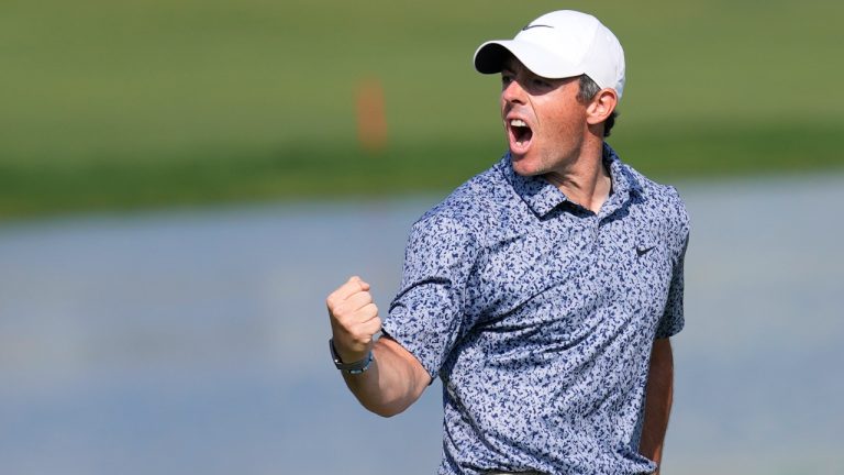 Rory McIlroy of Northern Ireland celebrates after he won the the Dubai Desert Classic, in Dubai, United Arab Emirates. (Kamran Jebreili/AP)