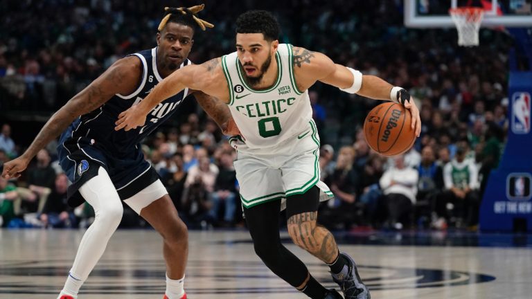 Boston Celtics forward Jayson Tatum drives against Dallas Mavericks forward Reggie Bullock (25) during the second half of an NBA basketball game in Dallas, Thursday, Jan. 5, 2023. (LM Otero/AP)