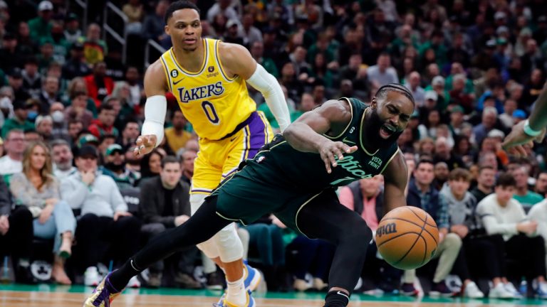 Boston Celtics' Jaylen Brown (7) looses control of the ball in front of Los Angeles Lakers' Russell Westbrook (0) during the first half of an NBA basketball game, Saturday, Jan. 28, 2023, in Boston. (Michael Dwyer/AP)