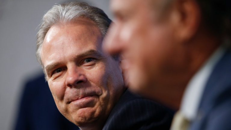 Winnipeg Jets General Manager Kevin Cheveldayoff smiles as new head coach Rick Bowness speaks at a press conference in Winnipeg, Monday, July 4, 2022. THE CANADIAN PRESS/John Woods