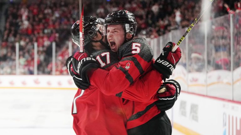 Canada’s Brandt Clarke, right, and Colton Dach celebrate Clarke’s goal during second period IIHF World Junior Hockey Championship pre-tournament hockey action against Finland in Halifax on Friday, December 23, 2022. (Darren Calabrese/The Canadian Press)