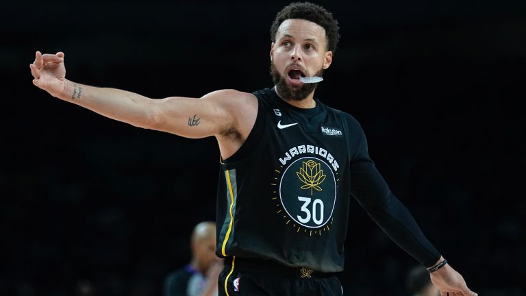 Golden State Warriors guard Stephen Curry (30) celebrates after a score against the San Antonio Spurs during the second half of an NBA basketball game in San Antonio, Friday, Jan. 13, 2023. (Eric Gay/AP)