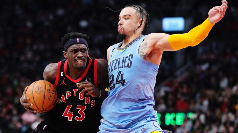 Toronto Raptors forward Pascal Siakam (43) drives at Memphis Grizzlies forward Dillon Brooks (24) during second half NBA basketball action in Toronto on Thursday, December 29, 2022. (Frank Gunn/CP)