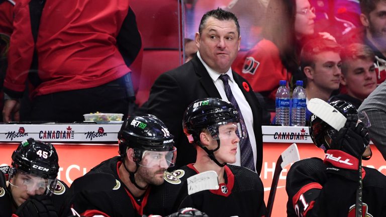 Ottawa Senators head coach D.J. Smith looks on during third period NHL hockey action against the Vancouver Canucks in Ottawa. (Justin Tang/CP)