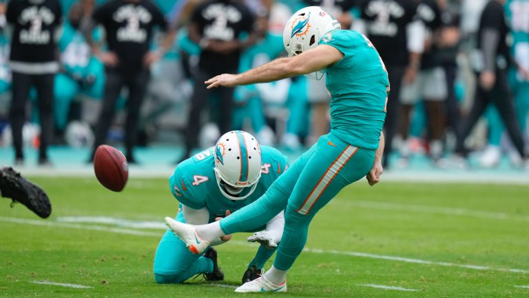 Miami Dolphins place kicker Jason Sanders (7) kicks a field goal as punter Thomas Morstead (4)holds, during the first half of an NFL football game against the New York Jets, Sunday, Jan. 8, 2023, in Miami Gardens, Fla. (Lynne Sladky/NFL)