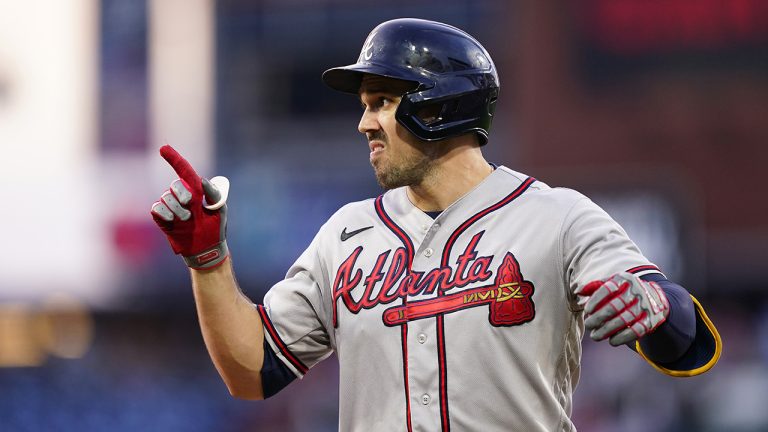 Former Atlanta Braves outfielder Adam Duvall reacts after hitting a run-scoring fielder's choice against Philadelphia Phillies pitcher Ranger Suarez during the fourth inning of a baseball game, Wednesday, June 29, 2022, in Philadelphia. (Matt Slocum/AP)