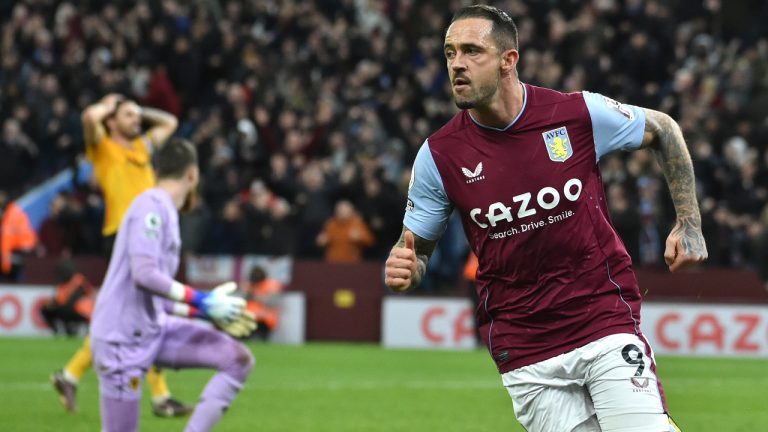 Aston Villa's Danny Ings, right, celebrates after he scores his side's first goal during the English Premier League soccer match between Aston Villa and Wolverhampton Wanderers at Villa Park stadium in Birmingham, England Wednesday, Jan. 4, 2023. (Rui Vieira/AP) 