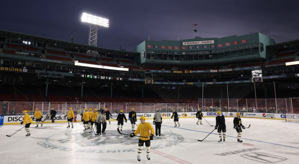 Bruins arrive at Fenway Park Winter Classic in Red Sox uniforms 