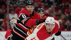 Domi scores OT winner to lift Blackhawks over Flames