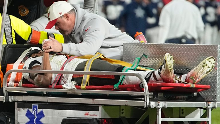 Tampa Bay Buccaneers wide receiver Russell Gage is taken off the filed after being injured against the Dallas Cowboys during the second half of an NFL wild-card football game, Monday, Jan. 16, 2023, in Tampa, Fla. (Chris Carlson/AP)