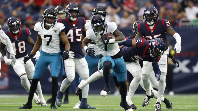 Travis Etienne Jr. #1 of the Jacksonville Jaguars carries the ball for a touchdown against the Houston Texans during the second quarter of the game at NRG Stadium on January 01, 2023 in Houston, Texas. (Tim Warner/Getty Images)